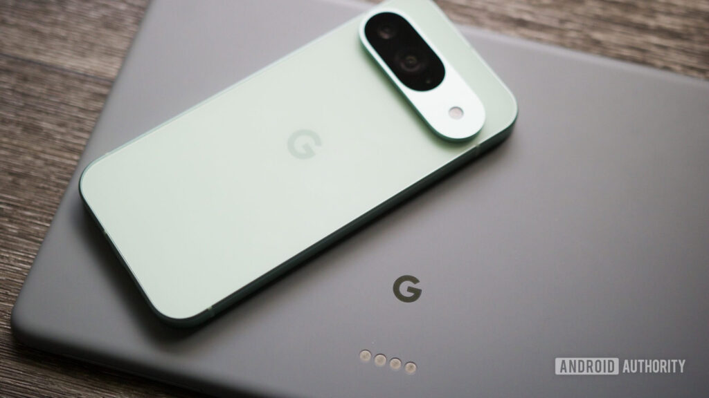 A Google Pixel 9 resting on top of a Pixel Tablet.