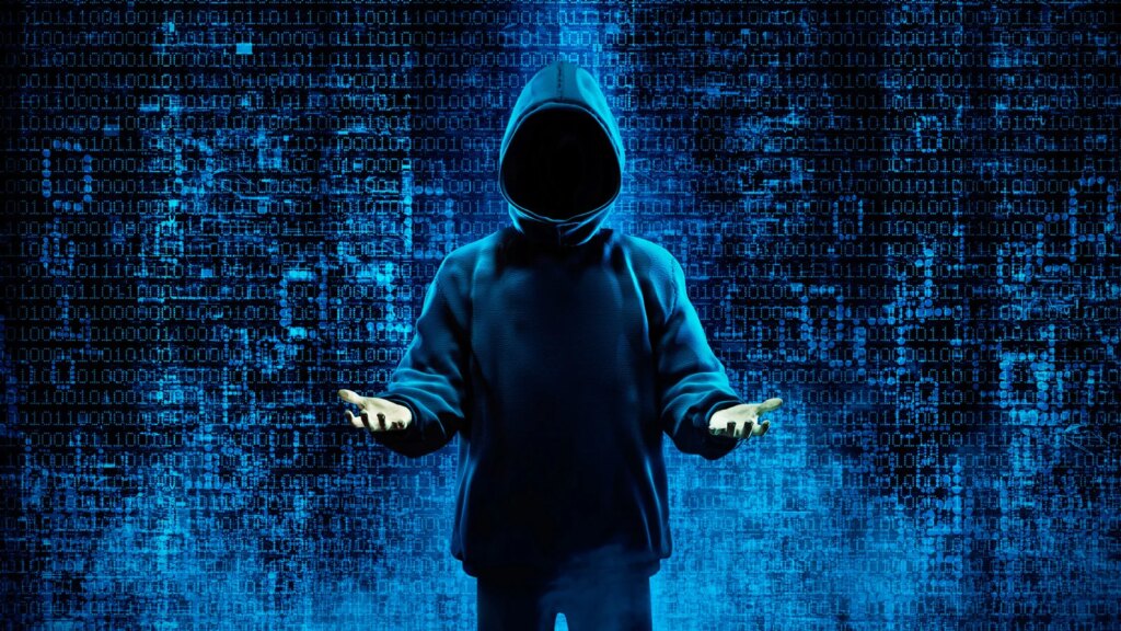 BreachForums hacking forum database leaked, exposing 324,000 accounts Hacker holding hands up