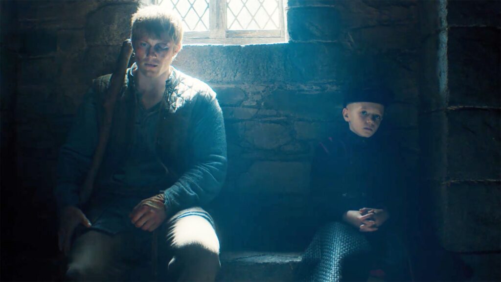 A Knight of the Seven Kingdoms season 1 ending explained: what happens to Dunk and Egg, will there be a season 2, and more Dunk and Egg sitting on a bench inside a building as light pores in from a window in A Knight of the Seven Kingdoms episode 6
