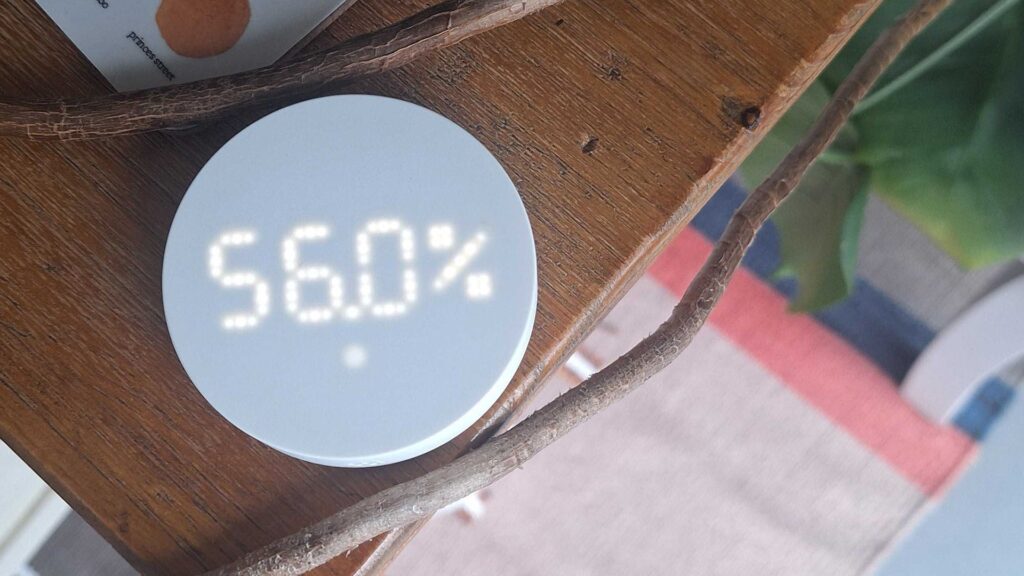 Despite being designed to ‘connect and just work’, it turns out IKEA’s new smart home sensors actually have some specific, confusing hub requirements IKEA Timmerflotte temperature and humidity sensor on a wooden table with plants surrounding it