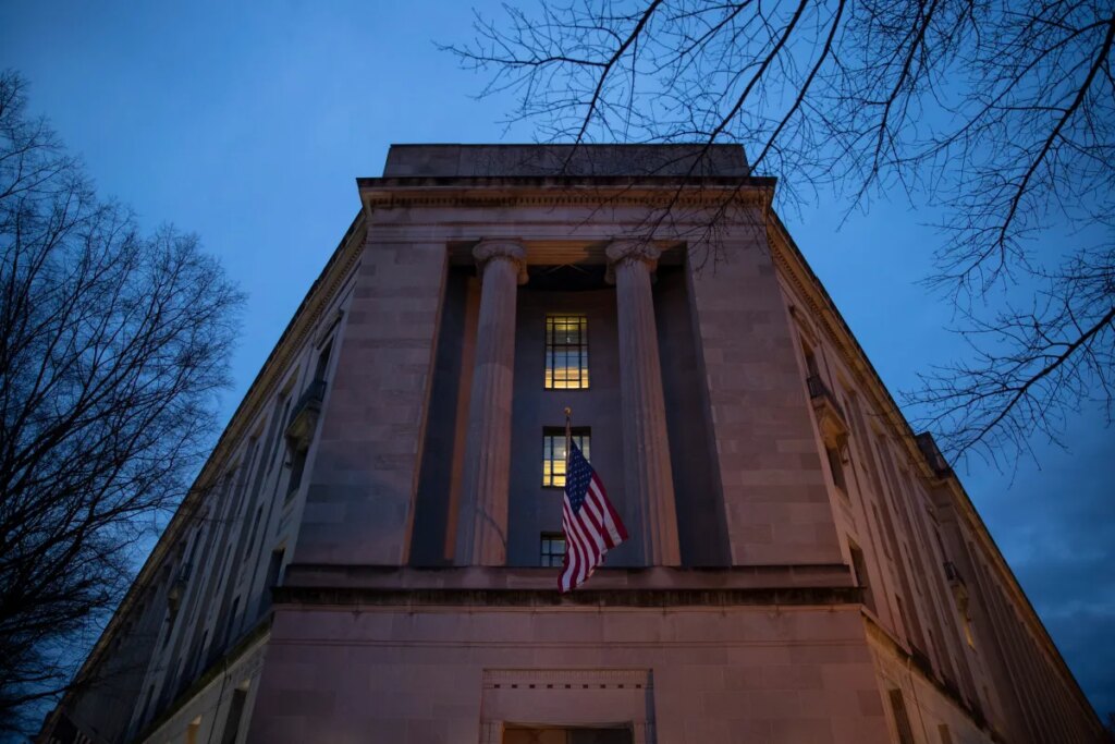 Fintech CEO and Forbes 30 Under 30 alum has been charged for alleged fraud Department of Justice stands in the early hours of Friday morning, March 22, 2019 in Washington, DC.