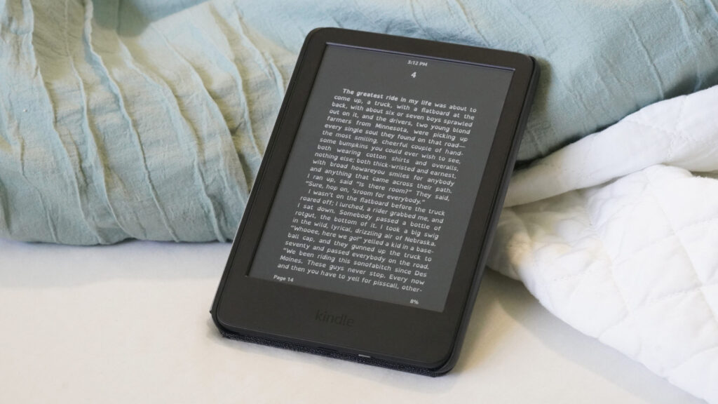 I read a lot more thanks to my Kindle, and I’m not alone A Kindle displays a user's book in Dark Mode.