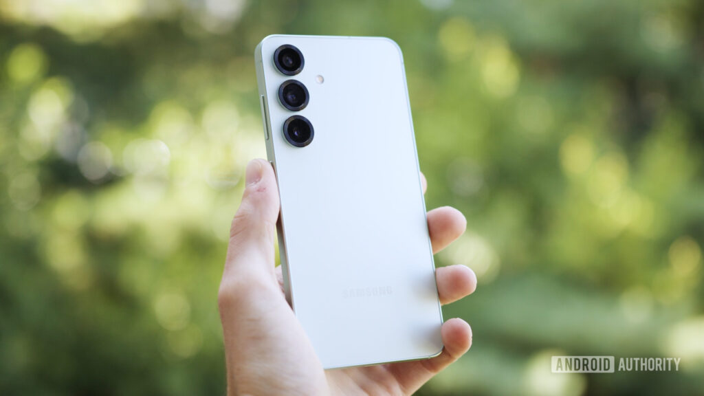Samsung hypes up the Galaxy S26 with new camera experience teaser Someone holding the Samsung Galaxy S25, showing the back of the phone.