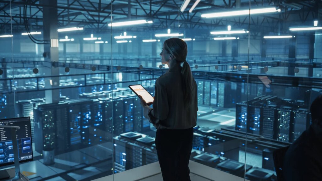 Analysis of one billion CISA KEV remediation records exposes limits of human-scale security Person looking over a datacenter
