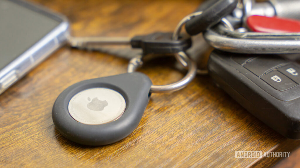 Get your 1st-gen Apple AirTags on sale while they are still available Apple AirTag on keychain stock photo