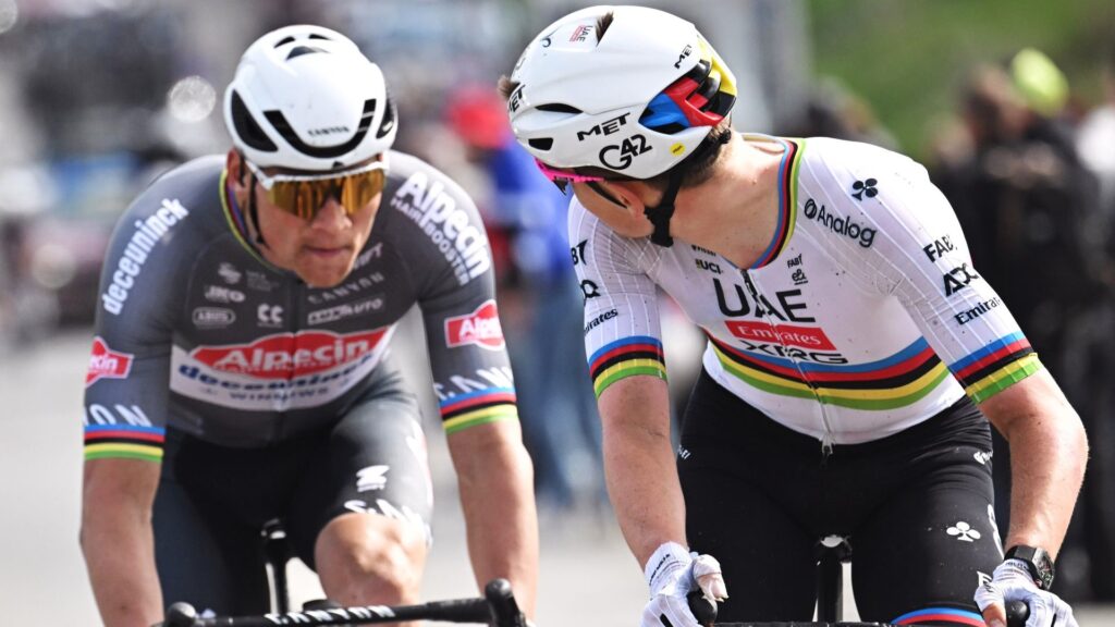 How to watch Paris-Roubaix 2026: Free Streams & TV Info Tadej Pogacar glancing back at Mathieu van der Poel during the Paris-Roubaix in 2025