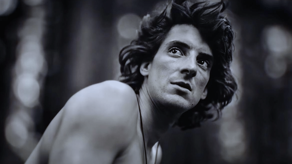 How to watch ‘The Dark Wizard’ — stream the climbing doc from anywhere Dean Potter, shirtless, pictured in a black and white photo before a solo climb
