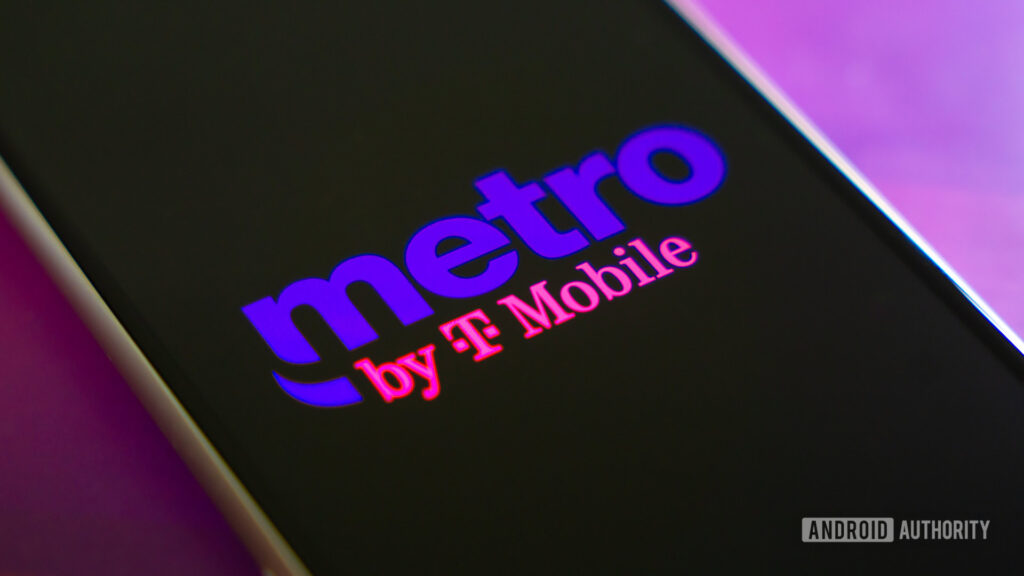 Metro by T-Mobile finally offers unlimited premium data Metro by T Mobile logo on smartphone