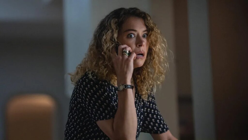 Apple TV: 28 of the Best Shows You’re Probably Not Watching Production still from Maximum Pleasure Guaranteed of Tatiana Maslany looking scared on the phone.