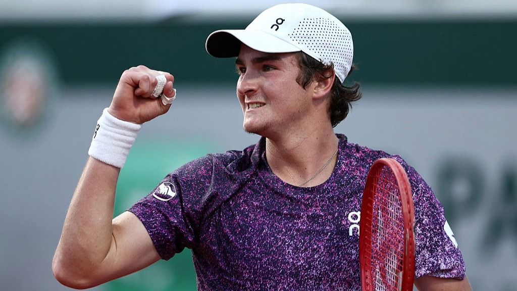 How to watch Ruud vs Fonseca: Free Streams for French Open 2026 fourth round Joao Fonseca punches the air after winning a point against Novak Djokovic at the French Open 2026.