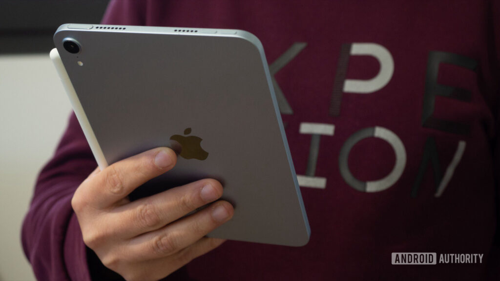 Need a new tablet? The Apple iPad Mini just dropped below $400 apple ipad mini 7 in hand
