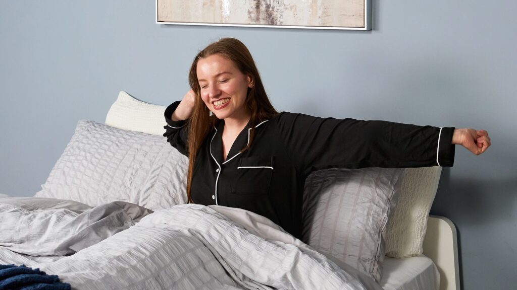 Study pinpoints the amount of sleep we need to slow biological ageing Sleep tester Frances Daniels wakes up in bed and stretches after a good night's sleep