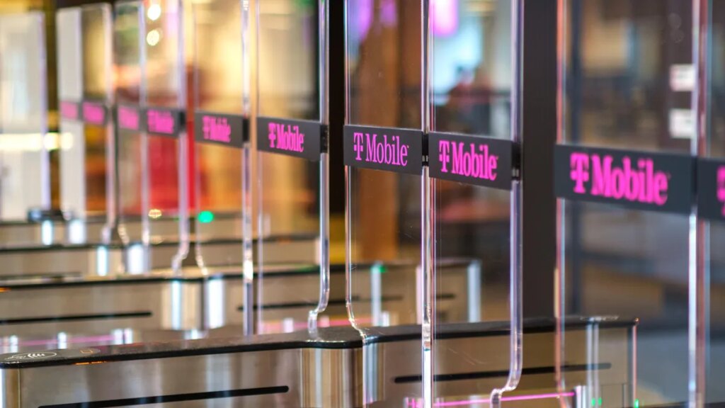 Clear plastic security gates with the T-mobile logo on them.