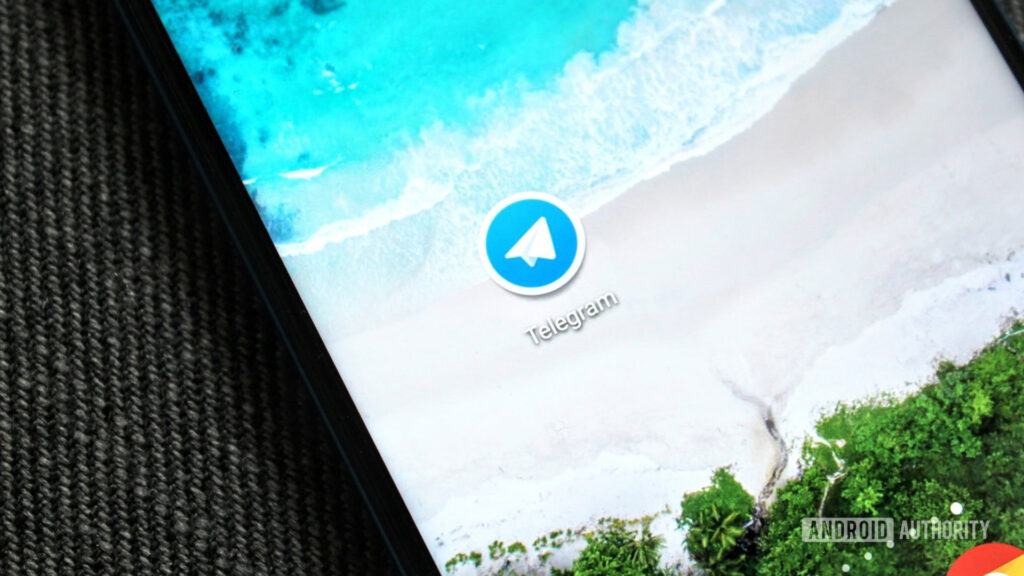 Telegram’s finally getting an official Wear OS app again The Telegram icon on an HONOR View 20 on a blue background.