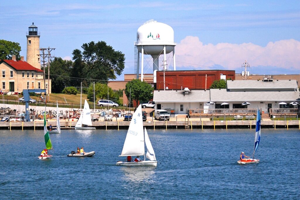 Wisconsin Casino Project Nears Approval as Federal Review Enters Final Phase A picture of sailboats in the water in front of the Kenosha, Wisconsin water tower.