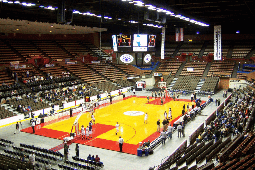 Arrest follows Nevada Fresno State betting investigation Interior view of a college basketball arena during a game warmup, featuring a hardwood court, scoreboard, spectator seating, and fans inside the Fresno State Save Mart Center in California. Nevada betting probe leads to arrest in Fresno State basketball case