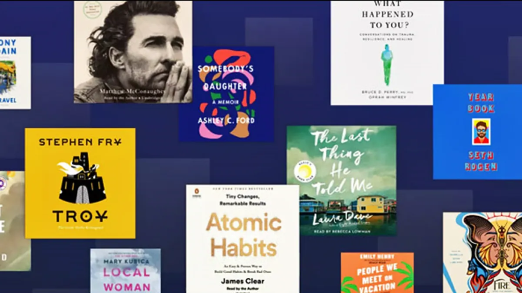 Audible book titles against a dark background.
