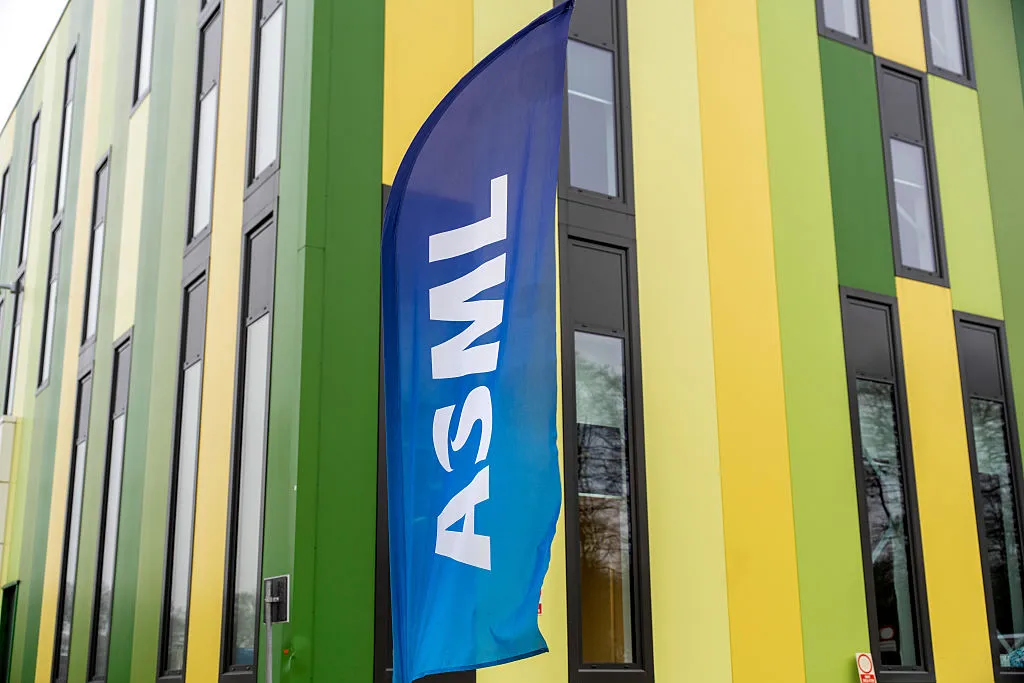 Europe is pushing back on Washington’s chip war A banner flag with the ASML logo outside the Brainport Industries Campus, which houses the ASML Academy, in Eindhoven, Netherlands.