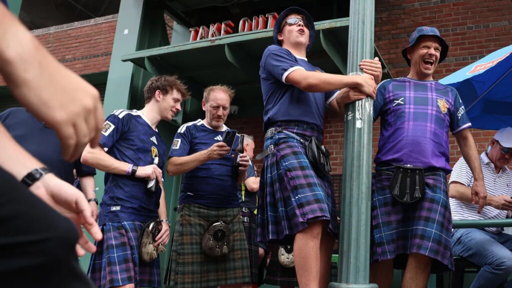 I Live in Massachusetts, and the Tartan Army Is the Best Thing to Hit My News Feed men in kilts in boston gather outside a pub