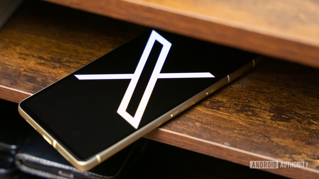Is X down for you? Here’s what’s going on (Update) X logo on smartphone stock photo (aka Twitter) (2)
