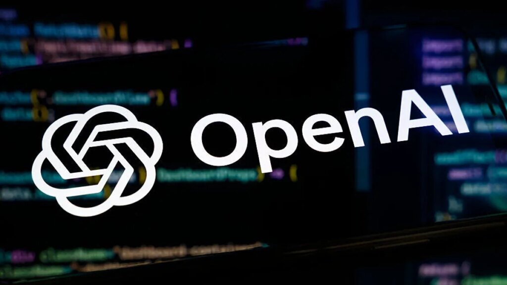 OpenAI Confirms Confidential IPO Filing, With Big Stakes for the AI Boom The OpenAI logo is displayed on a smartphone screen placed on a reflective surface.