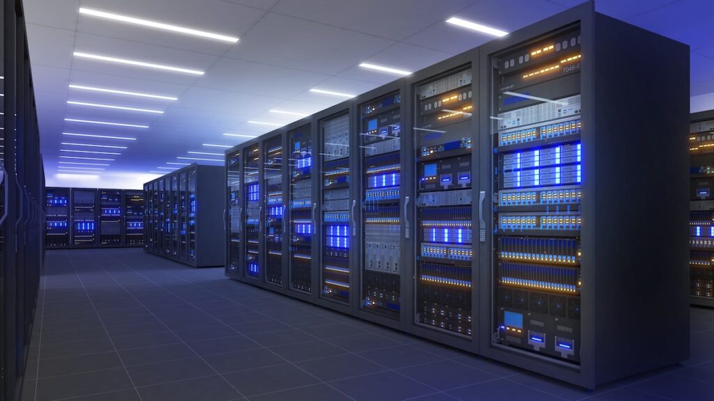 Interior of an AI data center with high-density server racks and networking infrastructure.
