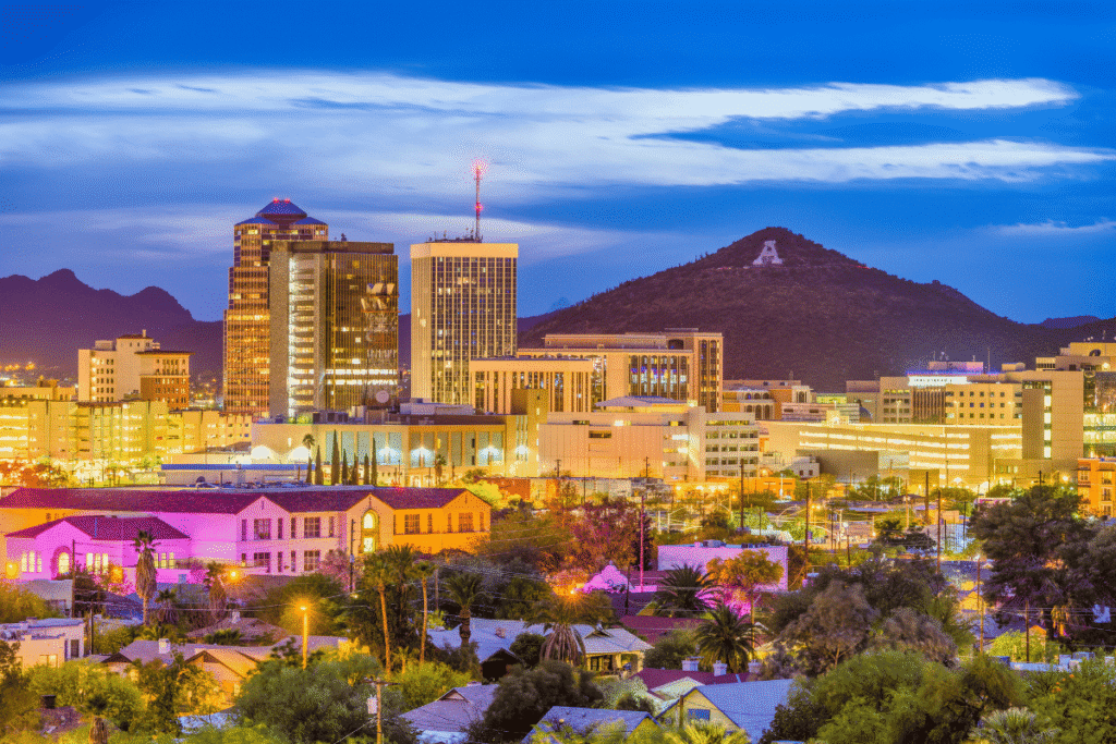 Arizona issues cease-and-desist orders to gambling operators Phoenix, Arizona skyline at dusk with downtown buildings and A Mountain, illustrating Arizona gaming regulator enforcement news. Arizona orders five online gambling operators to halt activities