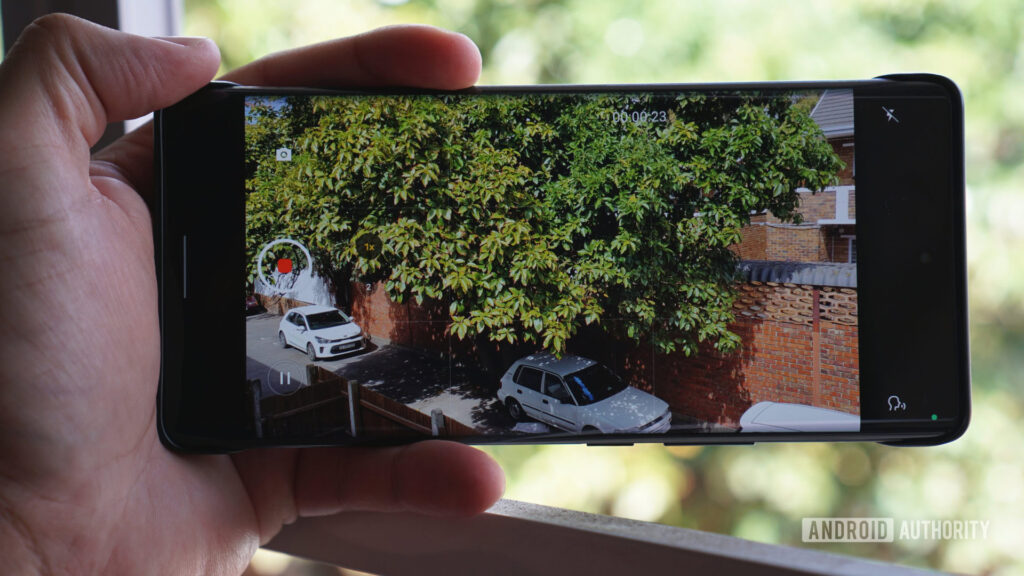 Google Photos is finally rolling out its new Video Remix tool A phone's camera app recording video.
